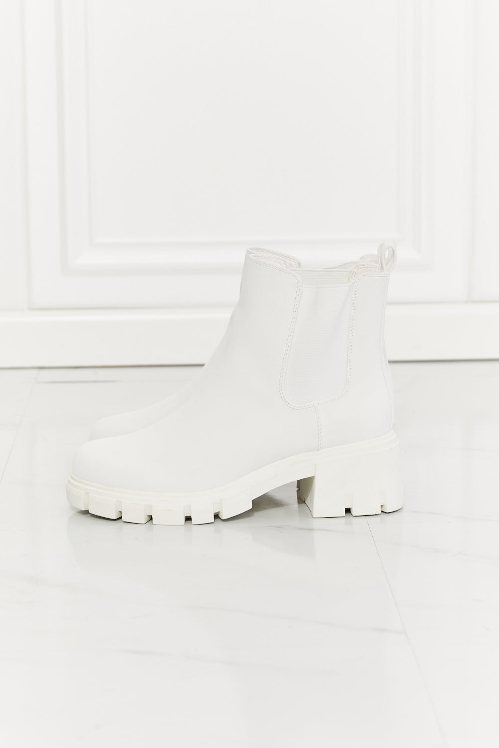 White lug clearance sole boots